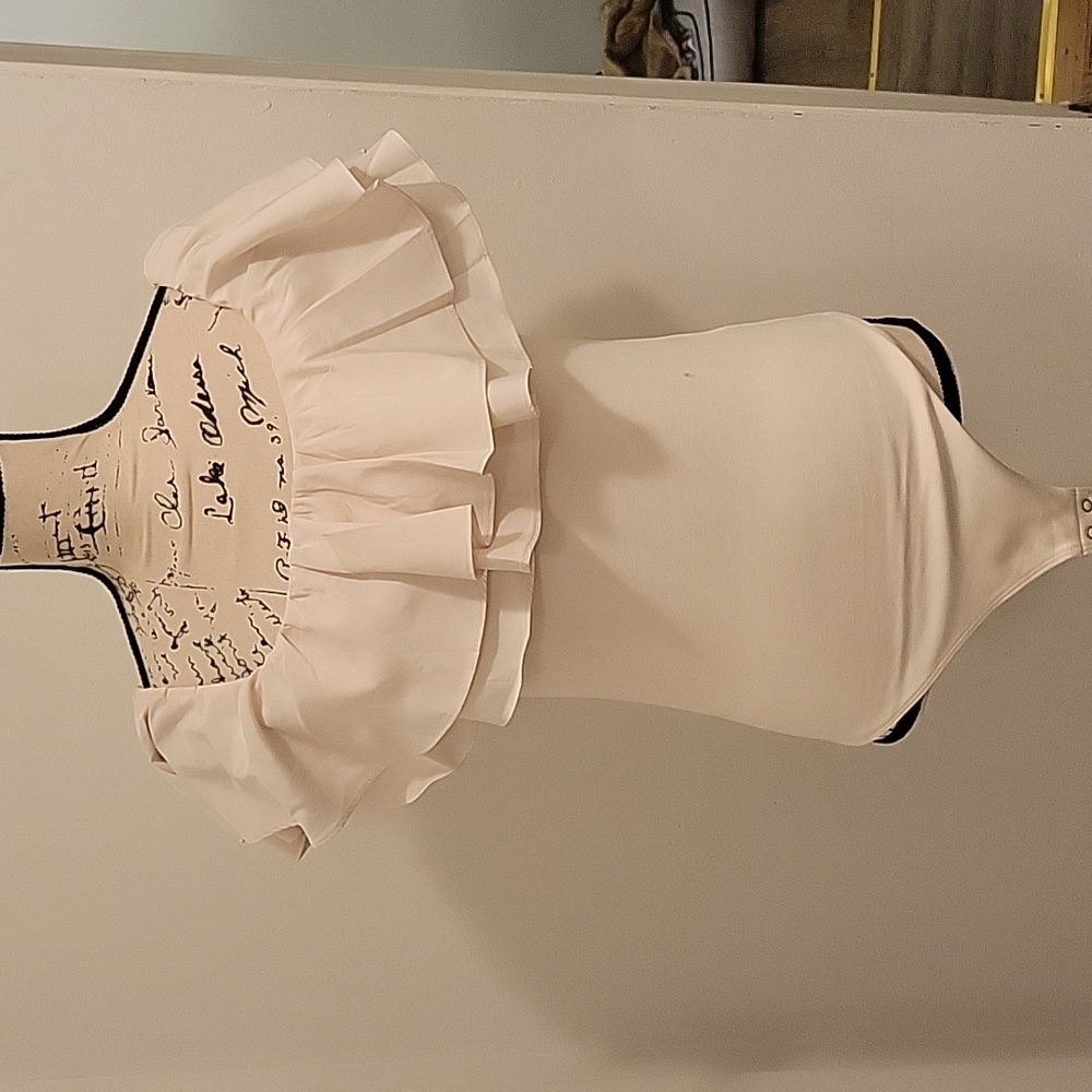 BNWT EXPRESS BODY SUIT. 1 is cream/white  sz. sm-1 black size M. s